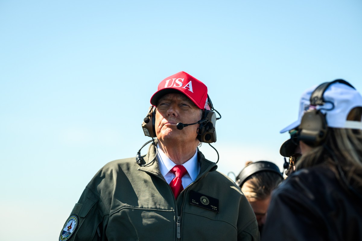 President Donald Trump and First Lady Melania Trump observe naval sea power demonstrations in honor of the 250th anniversary of the U.S. Navy, Sunday, October 5, 2025, aboard the USS George H.W. Bush in the Atlantic Ocean off the coast of Norfolk, Virginia. (Official White House Photo by Daniel Torok)