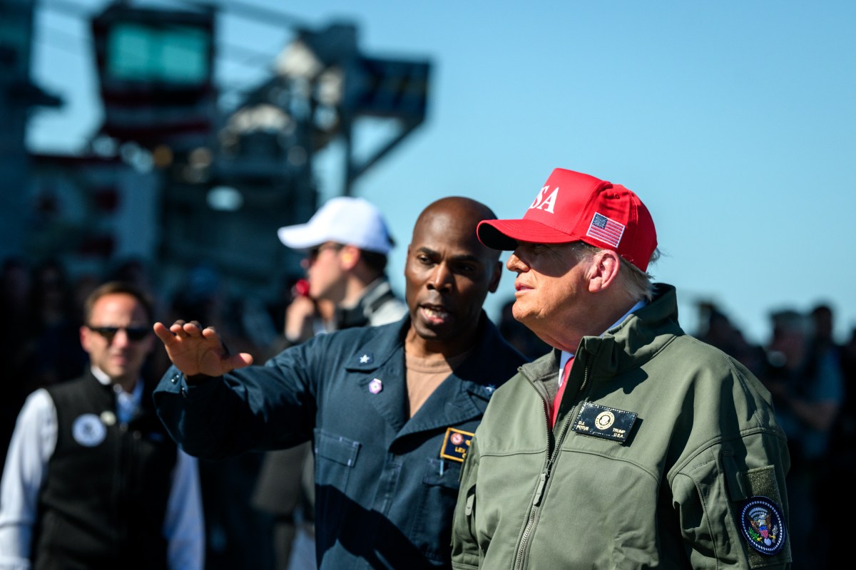President Donald Trump and First Lady Melania Trump speak to sailors after a naval sea power demonstration, Sunday, October 5, 2025, aboard the USS George H.W. Bush in the Atlantic Ocean off the coast of Norfolk, Virginia. (Official White House Photo by Daniel Torok)