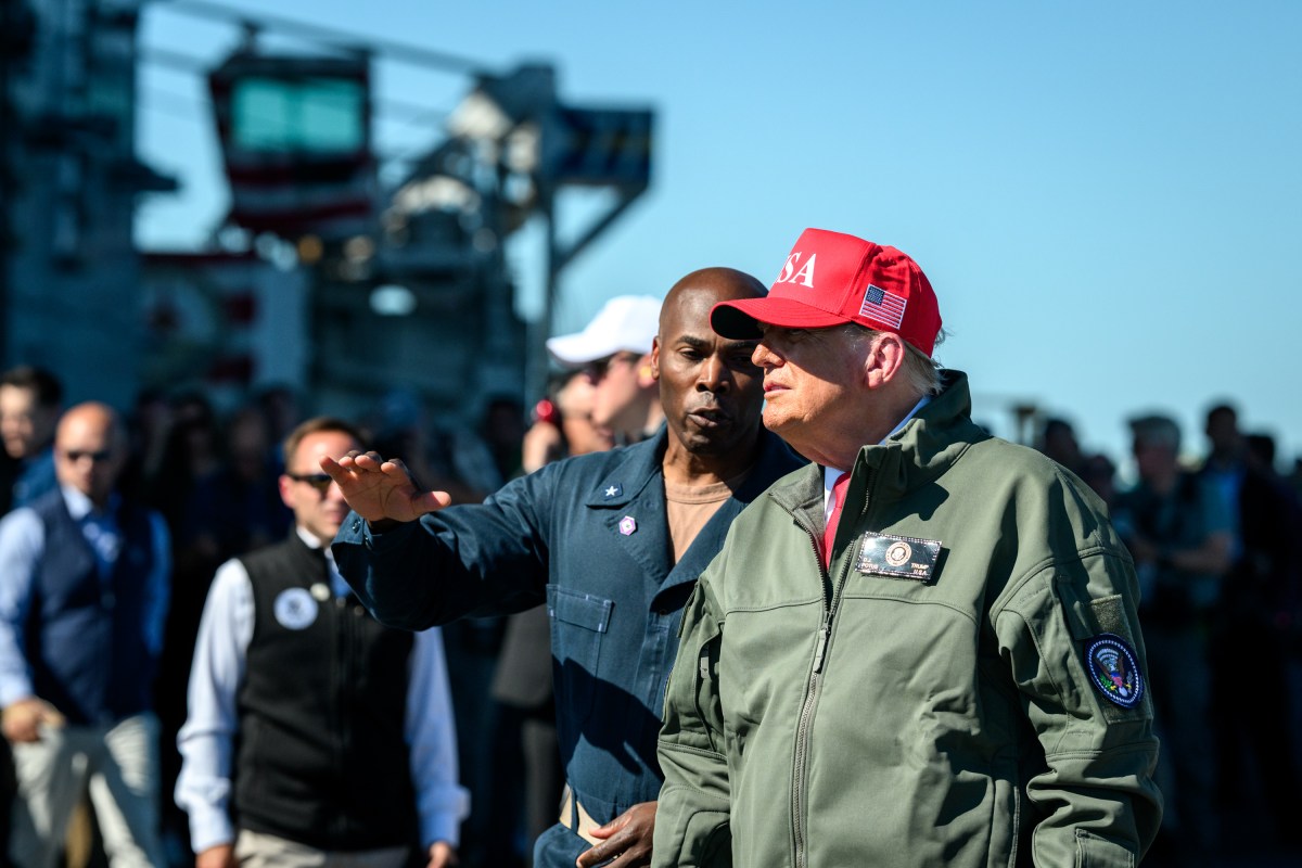 President Donald Trump and First Lady Melania Trump speak to sailors after a naval sea power demonstration, Sunday, October 5, 2025, aboard the USS George H.W. Bush in the Atlantic Ocean off the coast of Norfolk, Virginia. (Official White House Photo by Daniel Torok)