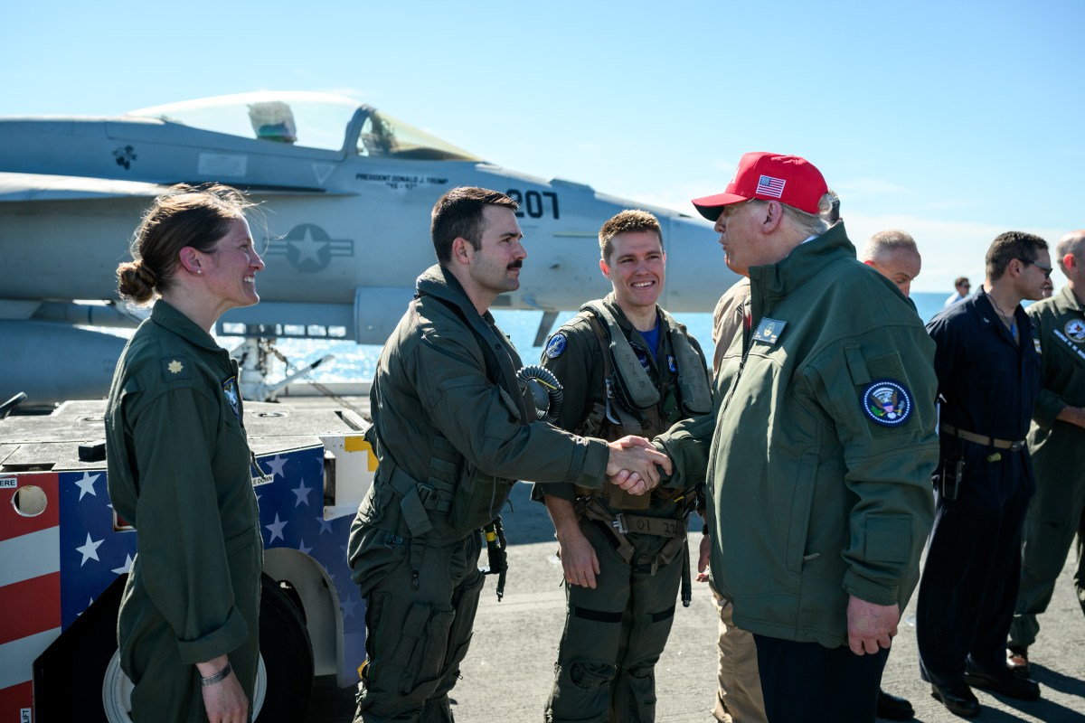 President Donald Trump and First Lady Melania Trump speak to sailors after a naval sea power demonstration, Sunday, October 5, 2025, aboard the USS George H.W. Bush in the Atlantic Ocean off the coast of Norfolk, Virginia. (Official White House Photo by Daniel Torok)