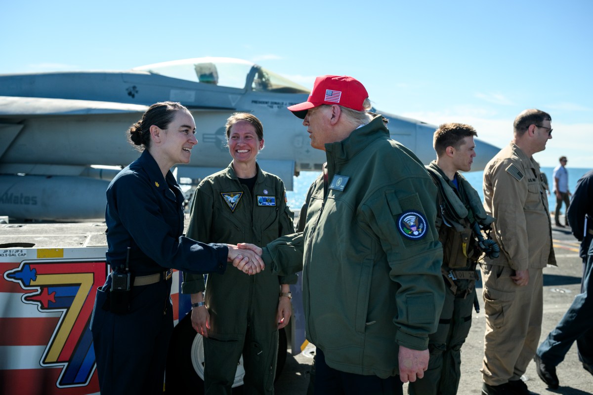 President Donald Trump and First Lady Melania Trump speak to sailors after a naval sea power demonstration, Sunday, October 5, 2025, aboard the USS George H.W. Bush in the Atlantic Ocean off the coast of Norfolk, Virginia. (Official White House Photo by Daniel Torok)
