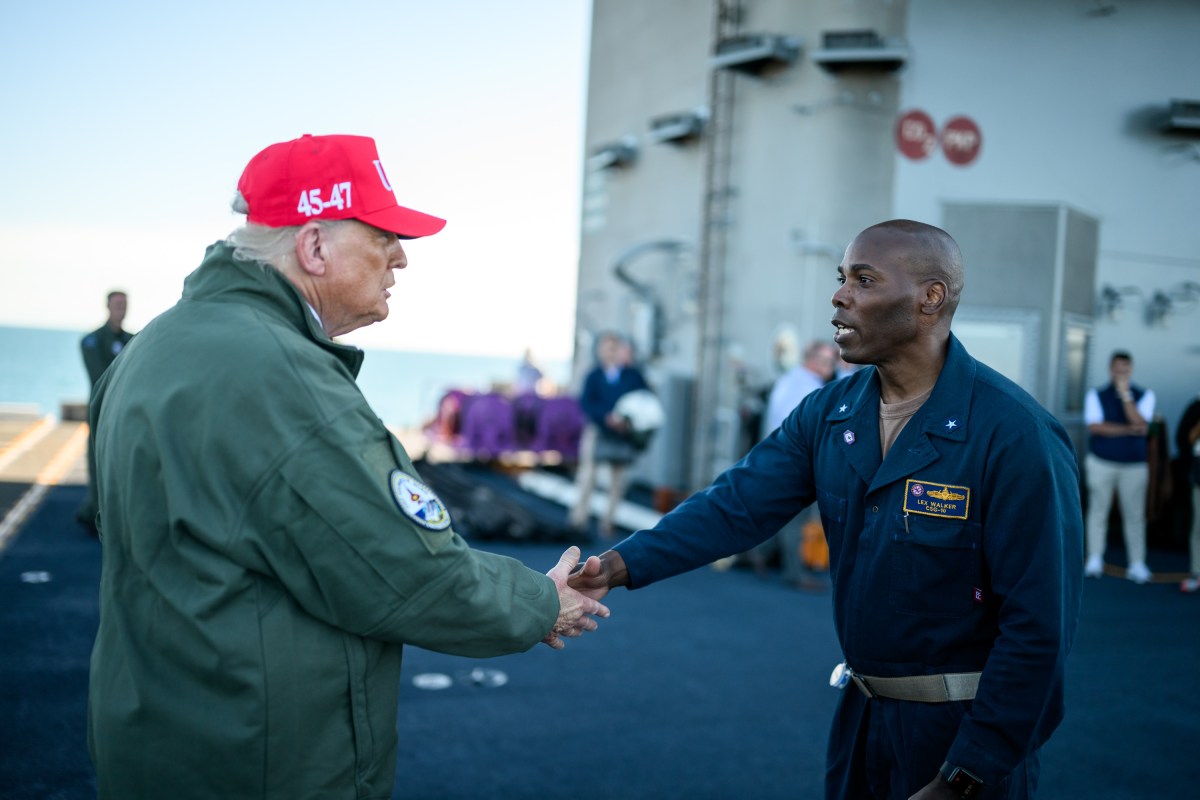 President Donald Trump and First Lady Melania Trump speak to sailors after a naval sea power demonstration, Sunday, October 5, 2025, aboard the USS George H.W. Bush in the Atlantic Ocean off the coast of Norfolk, Virginia. (Official White House Photo by Daniel Torok)