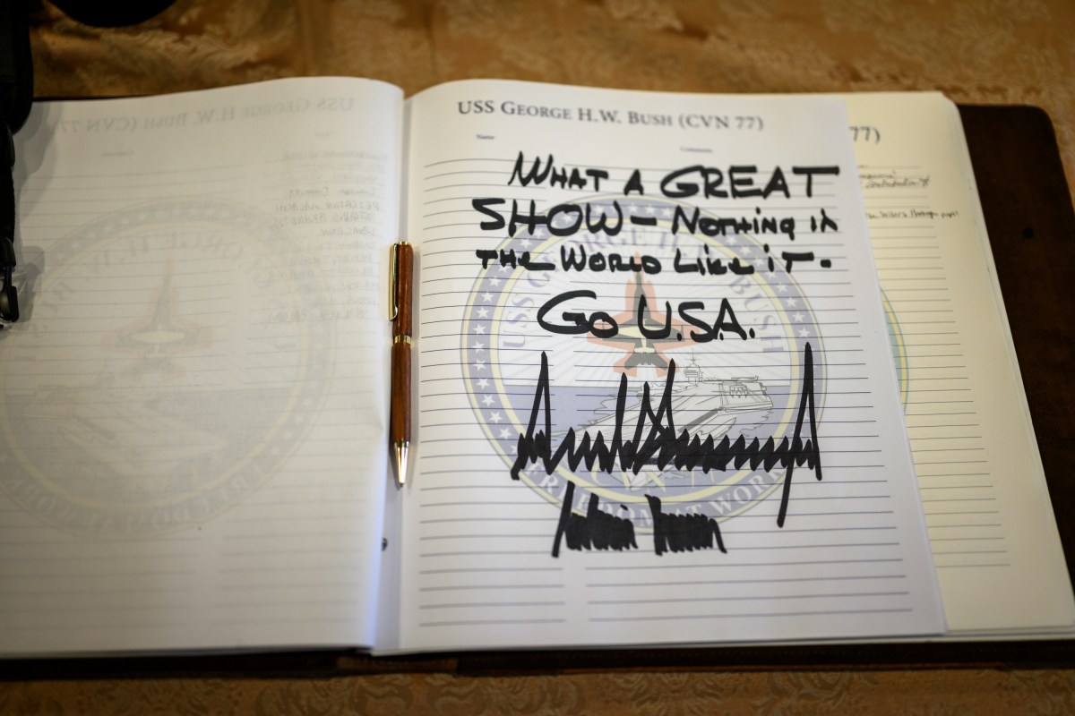 President Donald Trump’s signature in the guest book aboard the USS George H.W. Bush, Sunday, October 5, 2025. (Official White House Photo by Daniel Torok)