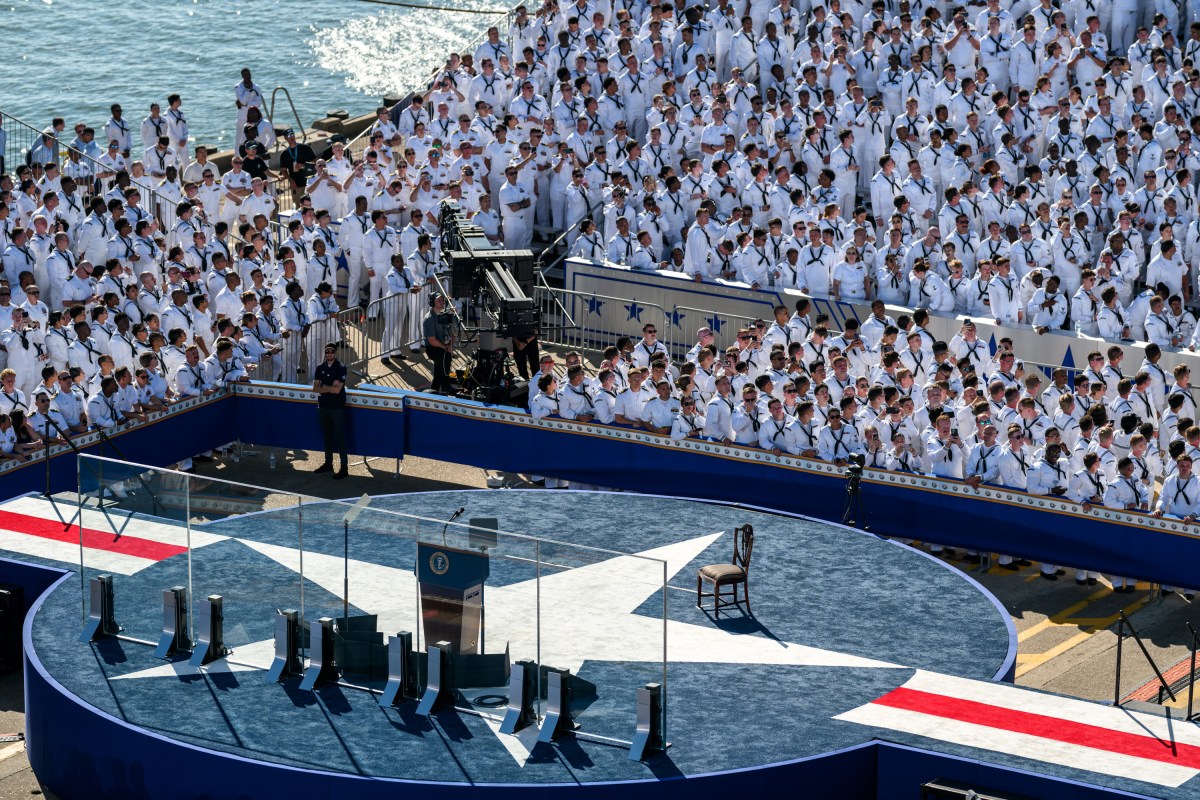 U.S. Navy sailors gather to watch President Donald Trump deliver remarks at the U.S. Navy 250th anniversary celebration at Naval Station Norfolk in Norfolk, Virginia, Sunday, October 5, 2025. (Official White House Photo by Daniel Torok)