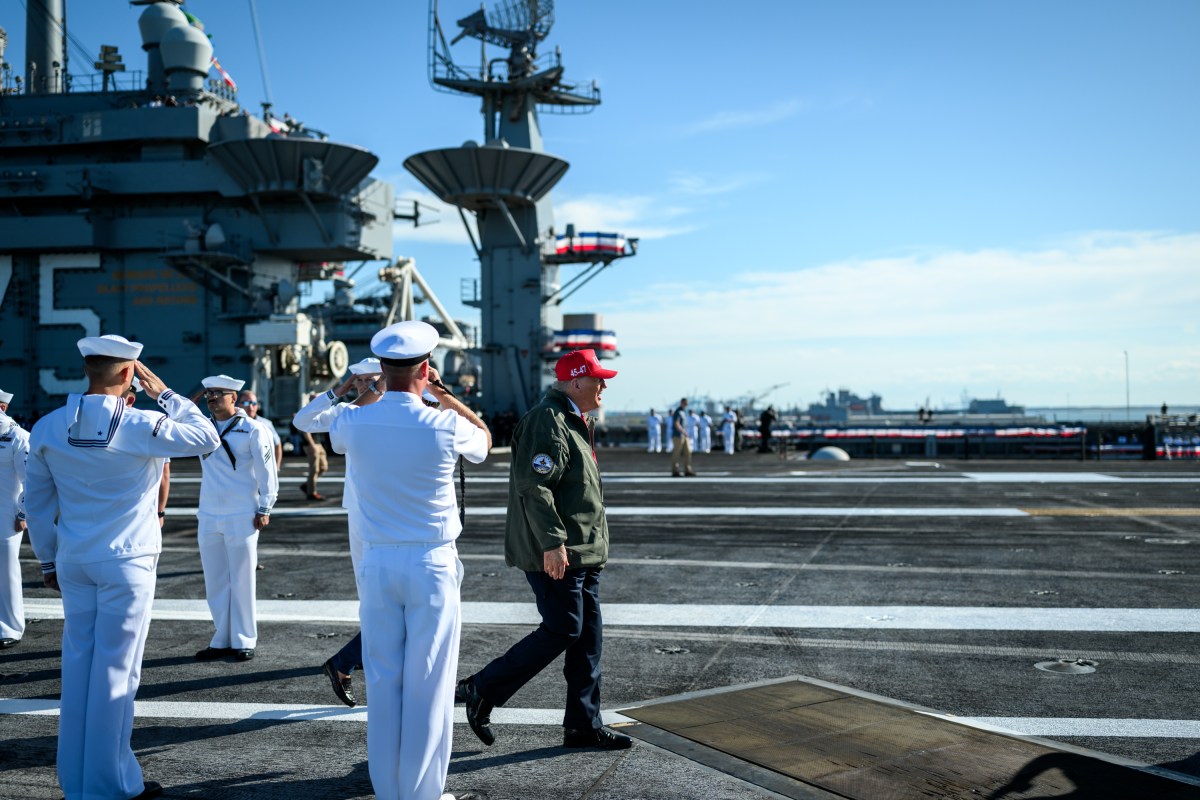 President Donald Trump and First Lady Melania Trump disembark Marine One at the USS Harry S. Truman aircraft carrier at Naval Station Norfolk in Norfolk, Virginia on Sunday, October 5, 2025. (Official White House Photo by Daniel Torok)