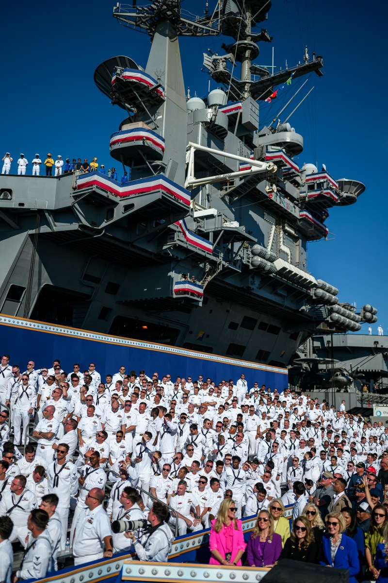 U.S. Navy sailors cheer before President Donald Trump delivers remarks in honor of the U.S. Navy 250th anniversary celebration at the USS Harry S. Truman aircraft carrier at Naval Station Norfolk in Norfolk, Virginia. (Official White House Photo by Daniel Torok)