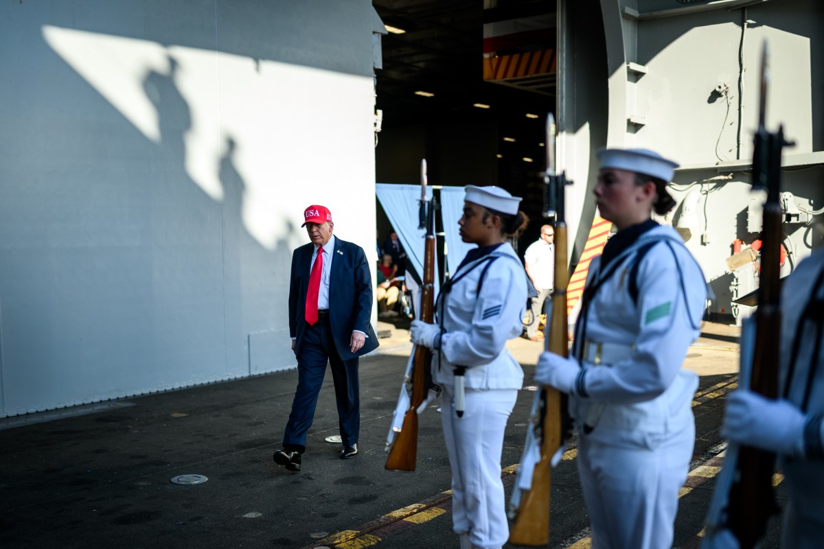 President Donald Trump salutes sailors as he walks toward the stage to deliver remarks in honor of the U.S. Navy 250th anniversary celebration at the USS Harry S. Truman aircraft carrier at Naval Station Norfolk in Norfolk, Virginia. (Official White House Photo by Daniel Torok)