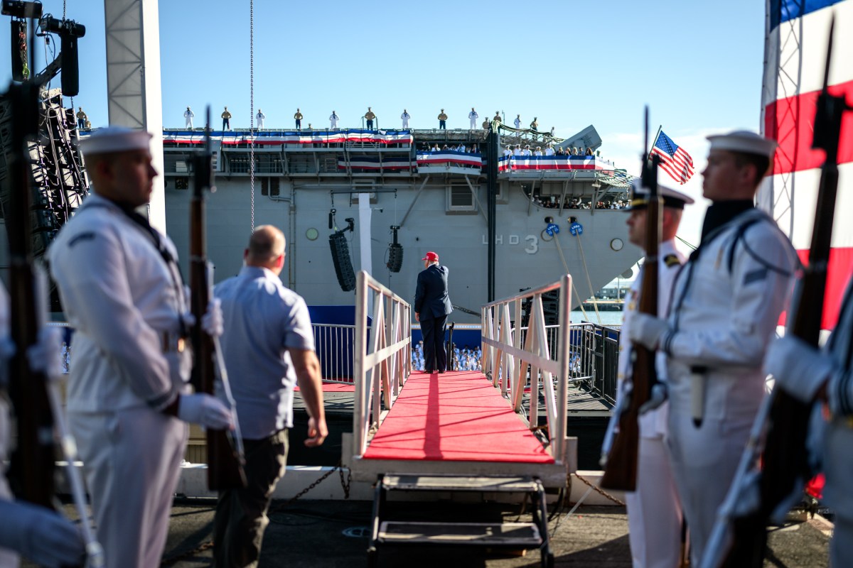 President Donald Trump walks towards the stage to deliver remarks in honor of the U.S. Navy 250th anniversary celebration at the USS Harry S. Truman aircraft carrier at Naval Station Norfolk in Norfolk, Virginia. (Official White House Photo by Daniel Torok)