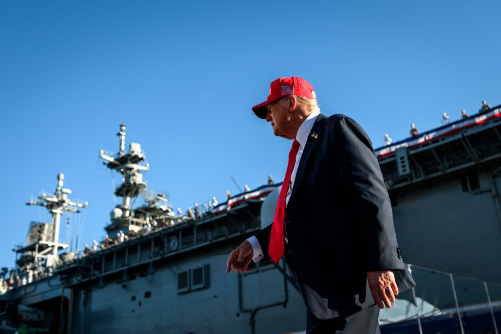President Donald Trump and First Lady Melania Trump wave to the crowd after delivering remarks in honor of the U.S. Navy 250th anniversary celebration at the USS Harry S. Truman aircraft carrier at Naval Station Norfolk in Norfolk, Virginia. (Official White House Photo by Daniel Torok)