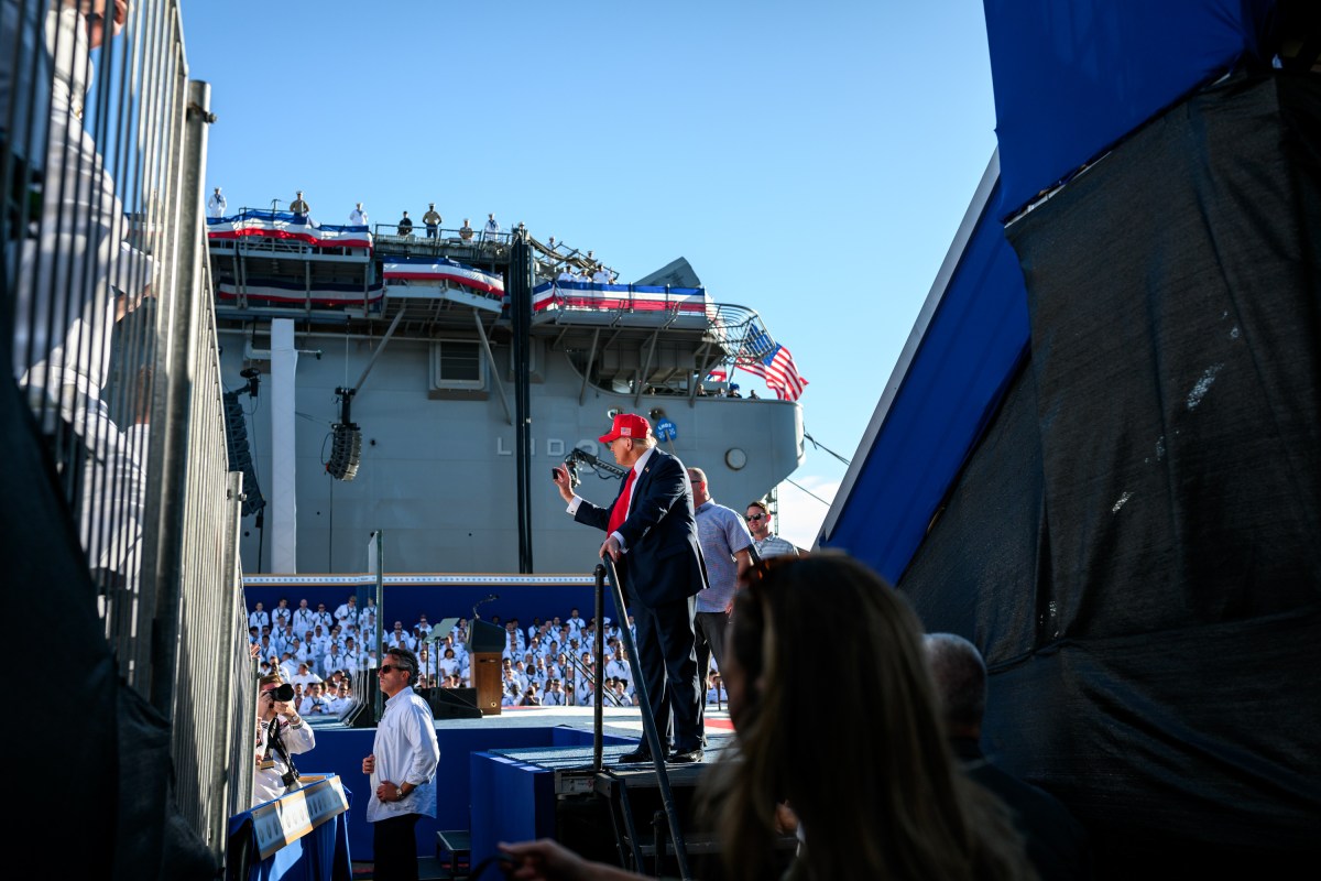 President Donald Trump and First Lady Melania Trump wave to the crowd after delivering remarks in honor of the U.S. Navy 250th anniversary celebration at the USS Harry S. Truman aircraft carrier at Naval Station Norfolk in Norfolk, Virginia. (Official White House Photo by Daniel Torok)