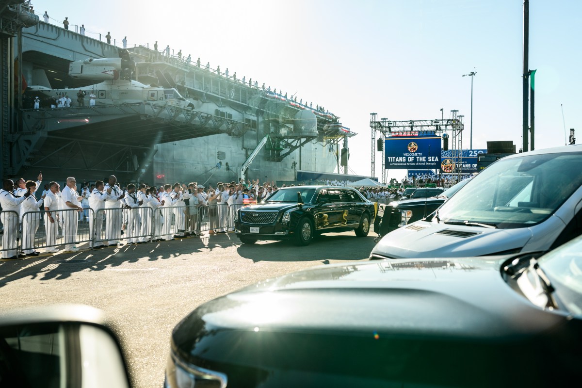 Crowds watch President Donald Trump and First Lady Melania Trump depart after delivering remarks in honor of the U.S. Navy 250th anniversary celebration at the USS Harry S. Truman aircraft carrier at Naval Station Norfolk in Norfolk, Virginia. (Official White House Photo by Daniel Torok)