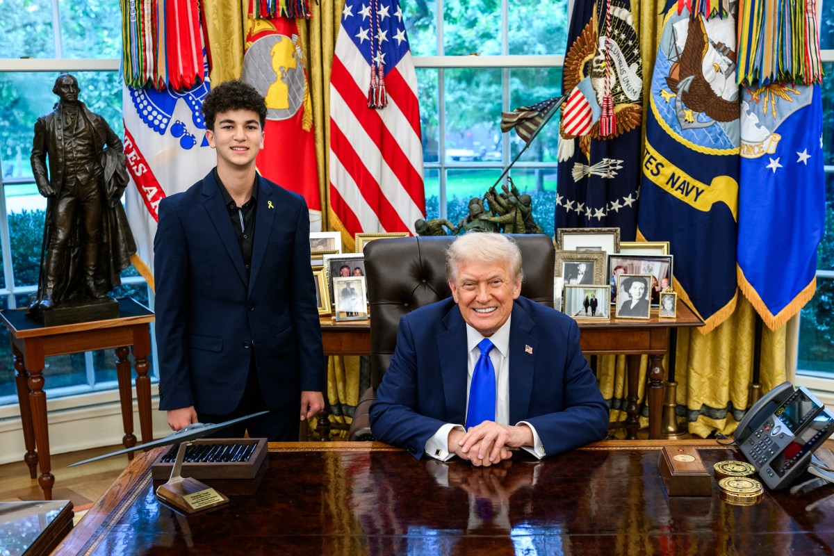 President Donald Trump meets with freed American-Israeli hostage Edan Alexander and others to mark the second anniversary of the Hamas-led terror attacks on Israel, Tuesday, October 7, 2025, in the Oval Office. (Official White House Photo by Daniel Torok)