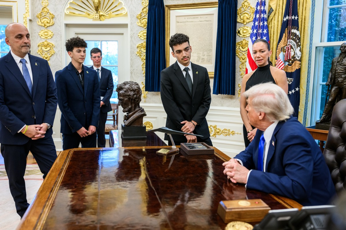 President Donald Trump meets with freed American-Israeli hostage Edan Alexander and others to mark the second anniversary of the Hamas-led terror attacks on Israel, Tuesday, October 7, 2025, in the Oval Office. (Official White House Photo by Daniel Torok)