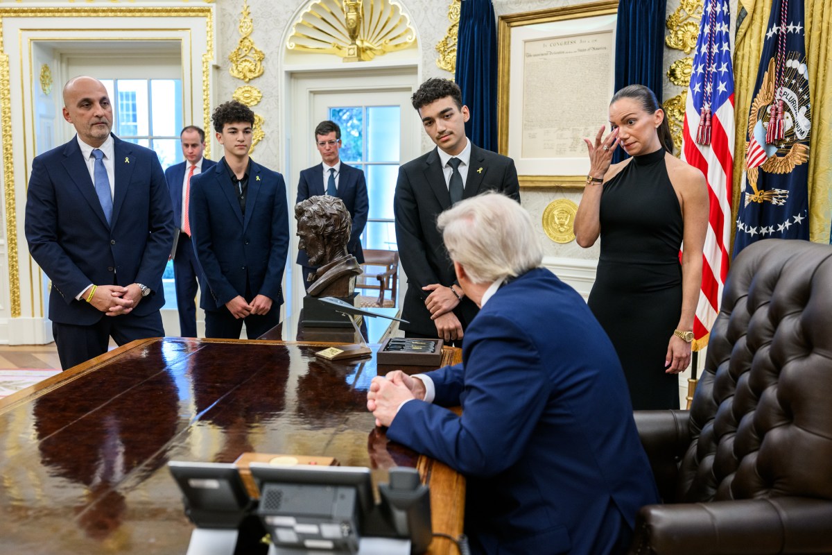 President Donald Trump meets with freed American-Israeli hostage Edan Alexander and others to mark the second anniversary of the Hamas-led terror attacks on Israel, Tuesday, October 7, 2025, in the Oval Office. (Official White House Photo by Daniel Torok)
