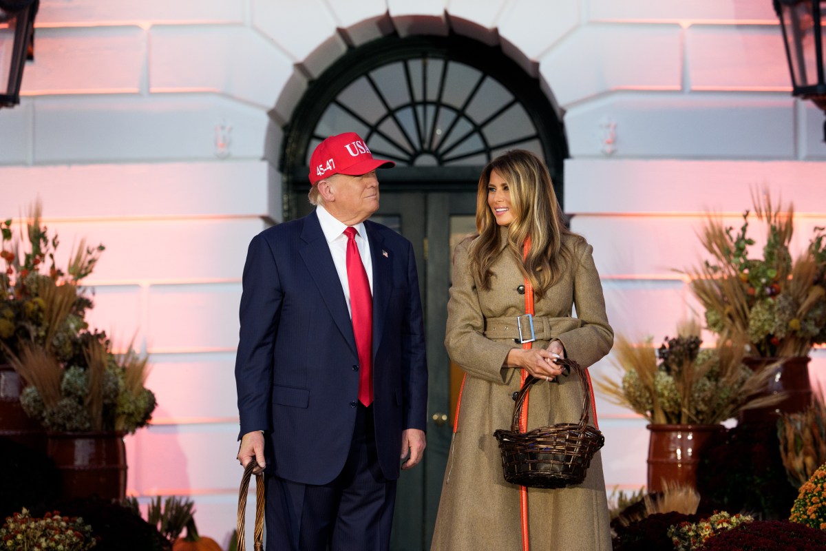 President Donald Trump and First Lady Melania Trump hand out candy to trick-or-treaters at the South Portico during Halloween celebrations at the White House, Thursday, October 30, 2025. (Official White House Photo by Andrea Hanks)
