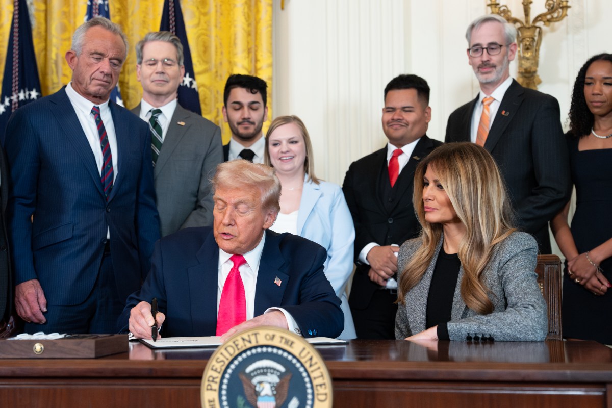 President Donald Trump signs a “Fostering the Future” executive order on foster care, Thursday, November 13, 2025, in the East Room of the White House. (Official White House Photo by Andrea Hanks)