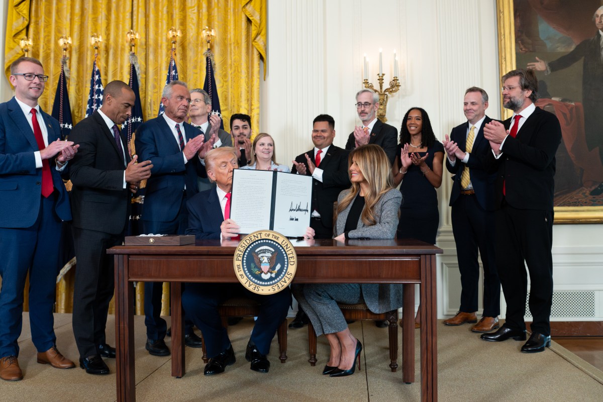 President Donald Trump signs a “Fostering the Future” executive order on foster care, Thursday, November 13, 2025, in the East Room of the White House. (Official White House Photo by Andrea Hanks)