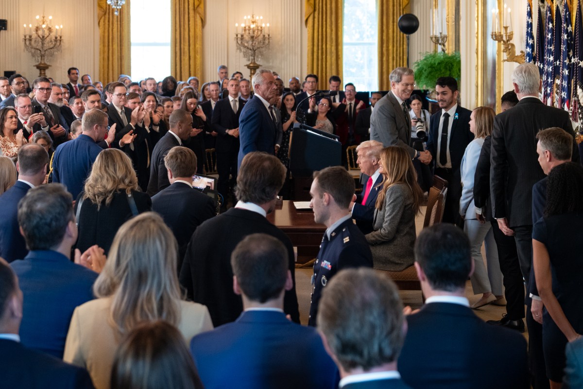 President Donald Trump signs a “Fostering the Future” executive order on foster care, Thursday, November 13, 2025, in the East Room of the White House. (Official White House Photo by Cody Hendrix)