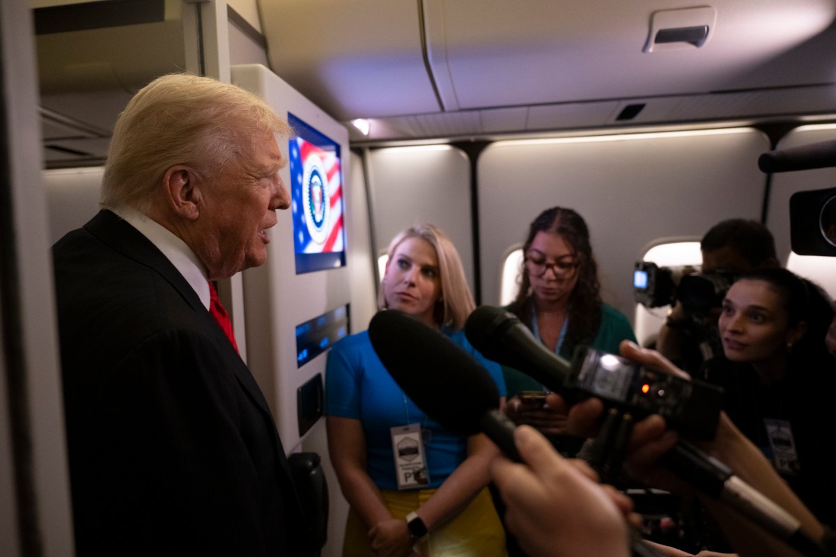 President Donald Trump speaks to the press aboard Air Force One after a trip to Florida on Sunday, November 2, 2025. (Official White House Photo by Joyce N. Boghosian)