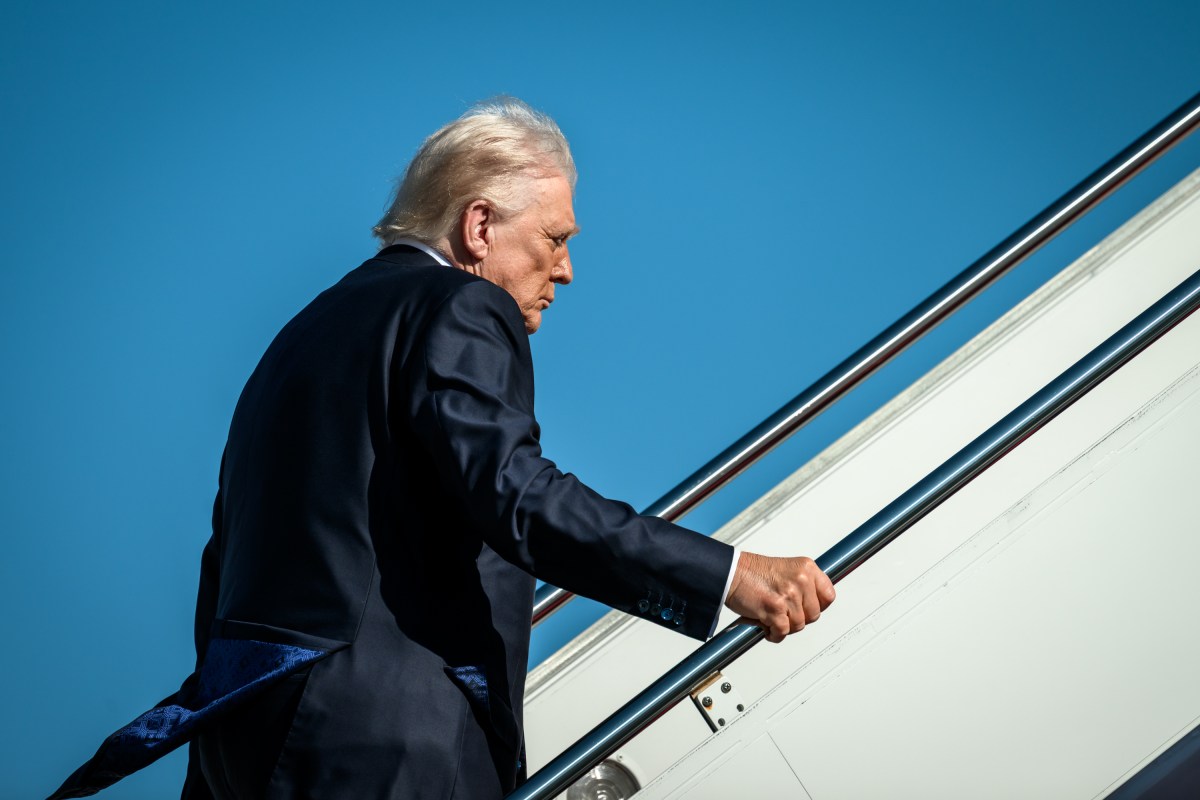 President Donald Trump boards Air Force One at Joint Base Andrews, Wednesday, November 5, 2025, en route to Miami, Florida. (Official White House Photo by Molly Riley)
