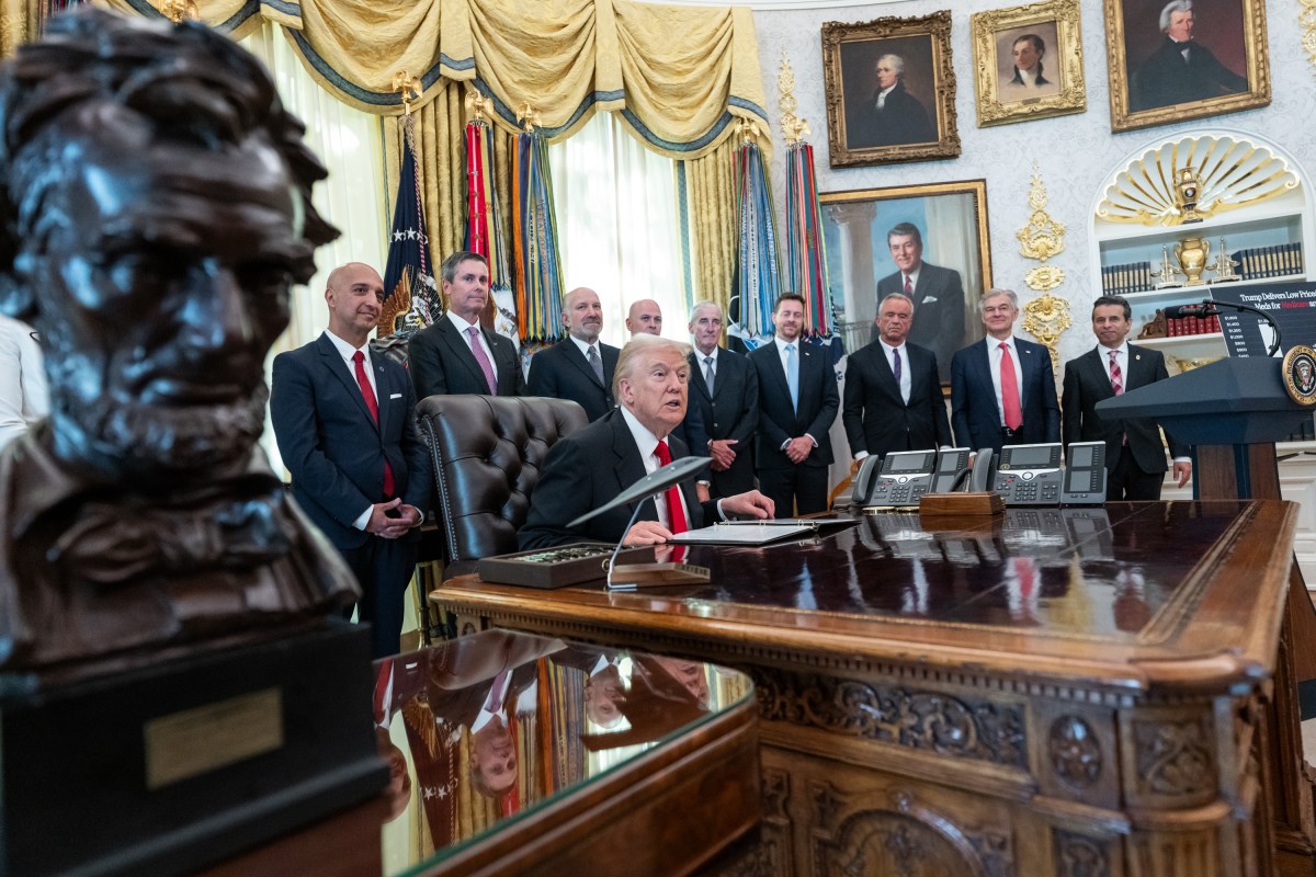 President Donald Trump makes an announcement on lowering drug prices alongside pharmaceutical representatives and Cabinet members in the Oval Office, Thursday, November 6, 2025. (Official White House Photo by Abe McNatt)