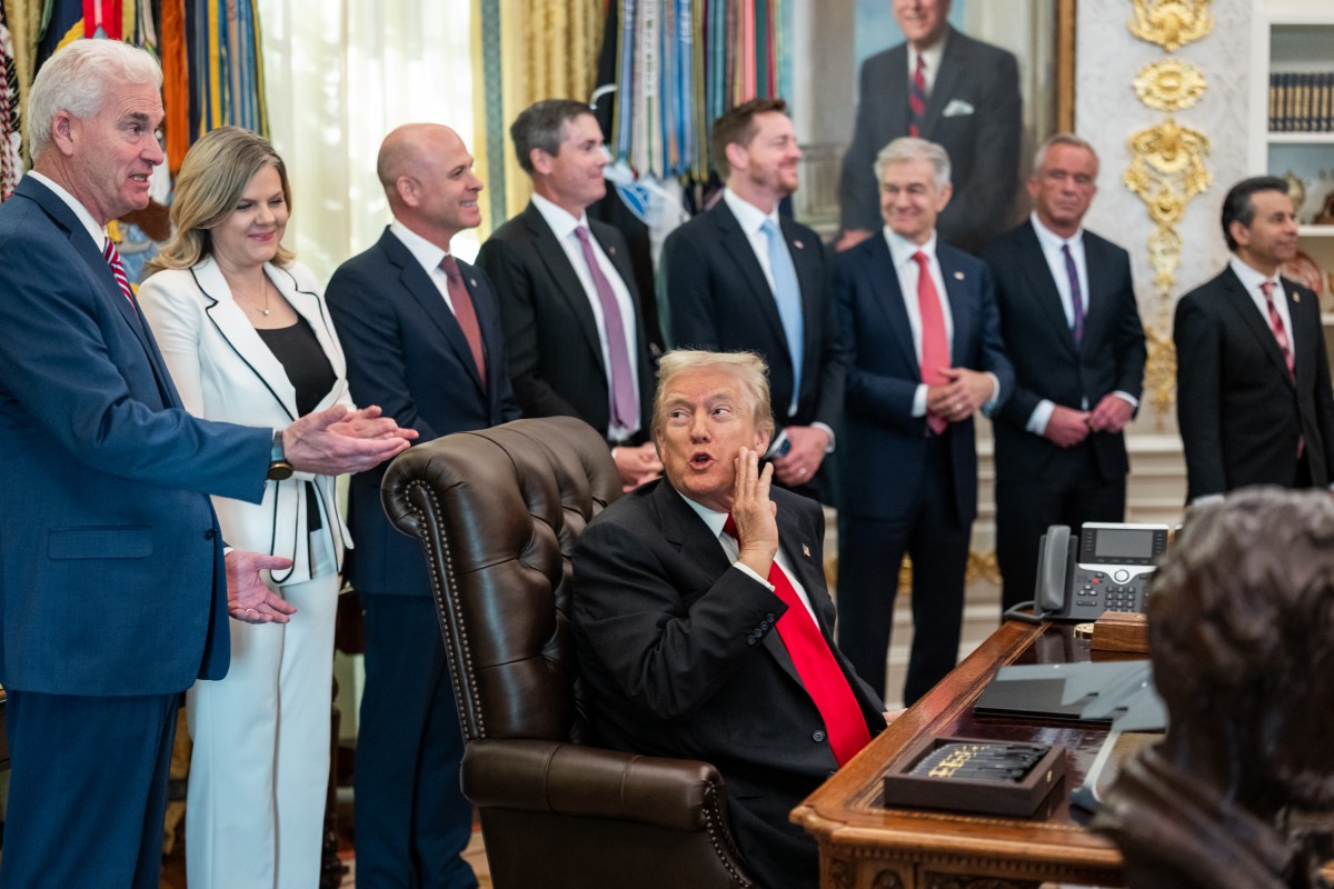 President Donald Trump makes an announcement on lowering drug prices alongside pharmaceutical representatives and Cabinet members in the Oval Office, Thursday, November 6, 2025. (Official White House Photo by Abe McNatt)