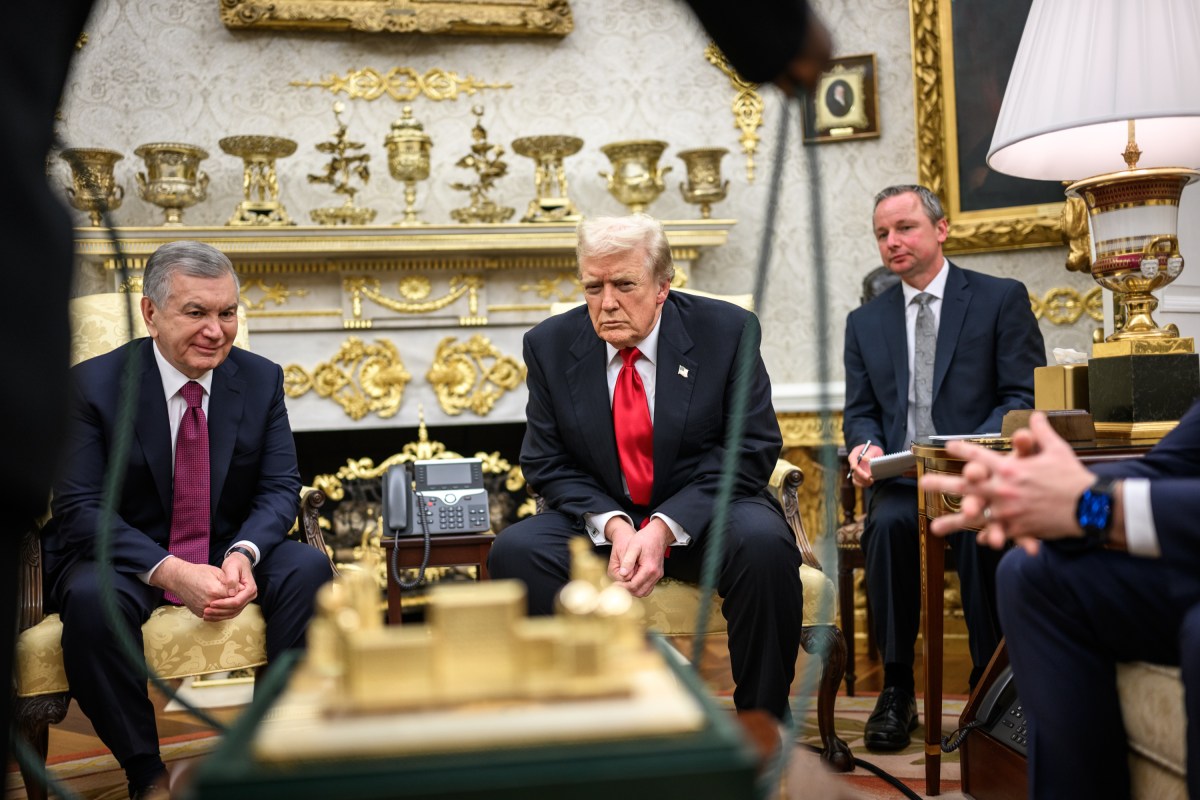 The President of the Republic of Uzbkeistan Shavkat Mirziyoyev presents President Donald Trump with a gift in the Oval Office before a dinner with other C5 Central Asian leaders, Thursday, November 6, 2025. (Official White House Photo by Daniel Torok)