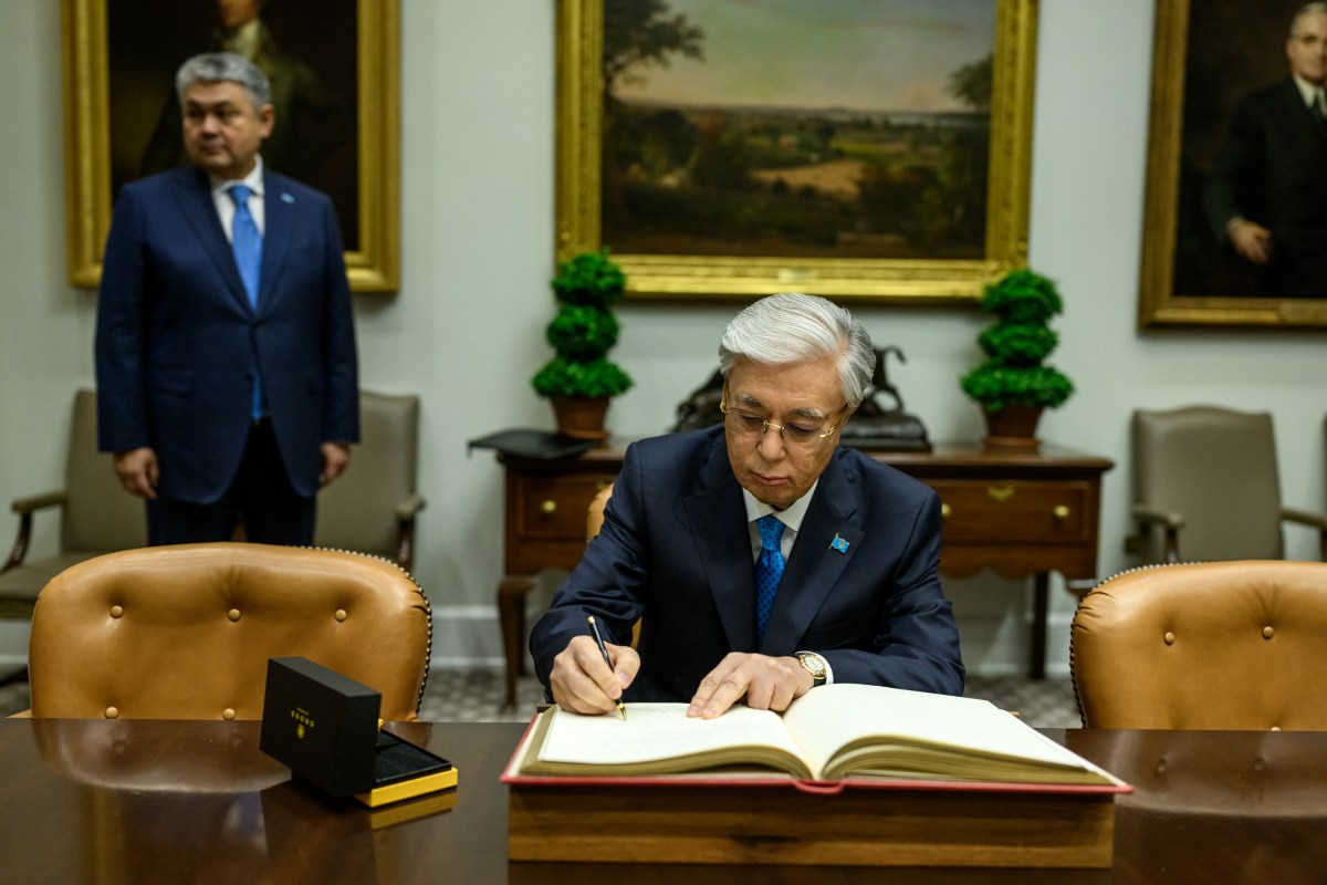 The President of the Republic of Kazakhstan Kassym-Jomart Tokayev signs the guest book in the Roosevelt Room of the White House before a dinner with President Donald Trump and other C5 Central Asian leaders, Thursday, November 6, 2025. (Official White House Photo by Molly Riley)