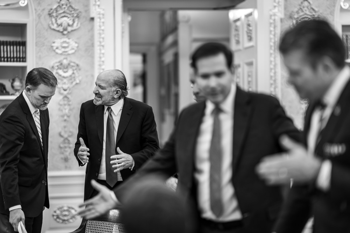 Secretary of Commerce Howard Lutnick speaks with Trade Representative Jamieson Greer in the Oval Office before the arrival of Prime Minister Viktor Orban of Hungary, Friday, November 7, 2025. (Official White House Photo by Daniel Torok)