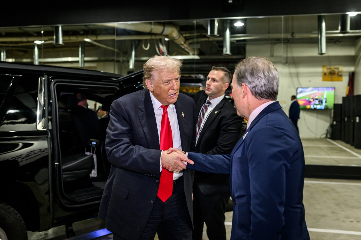 President Donald Trump is greeted by Washington Commanders owner Josh Harris as he arrives to an NFL game between the Washington Commanders and Detroit Lions at Northwest Stadium in Landover, Maryland, Sunday, November 9, 2025. (Official White House Photo by Daniel Torok)