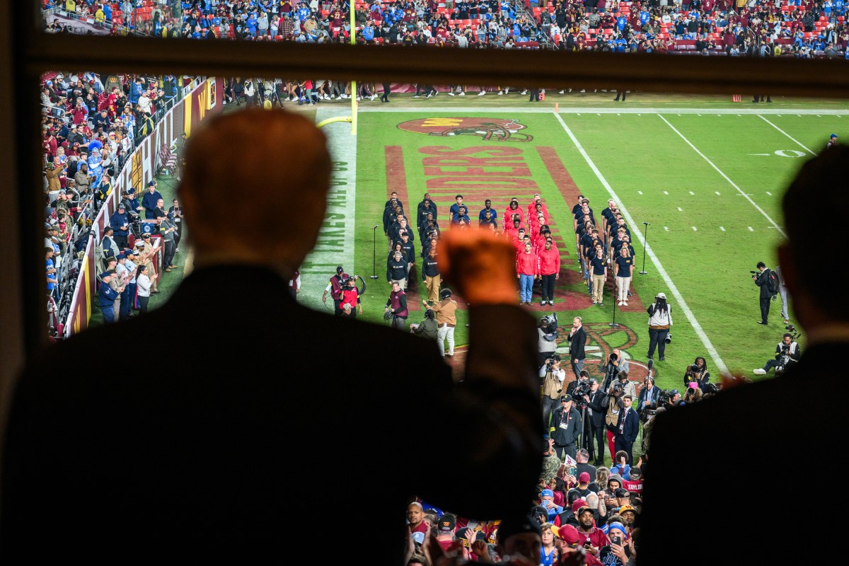 President Donald Trump delivers the Oath of Enlistment alongside Secretary of War Pete Hegseth during a “Salute to Service” halftime ceremony honoring active-duty service members, veterans, and their families ahead of Veterans Day at Northwest Stadium in Landover, Maryland, Sunday, November 9, 2025. (Official White House Photo by Daniel Torok)