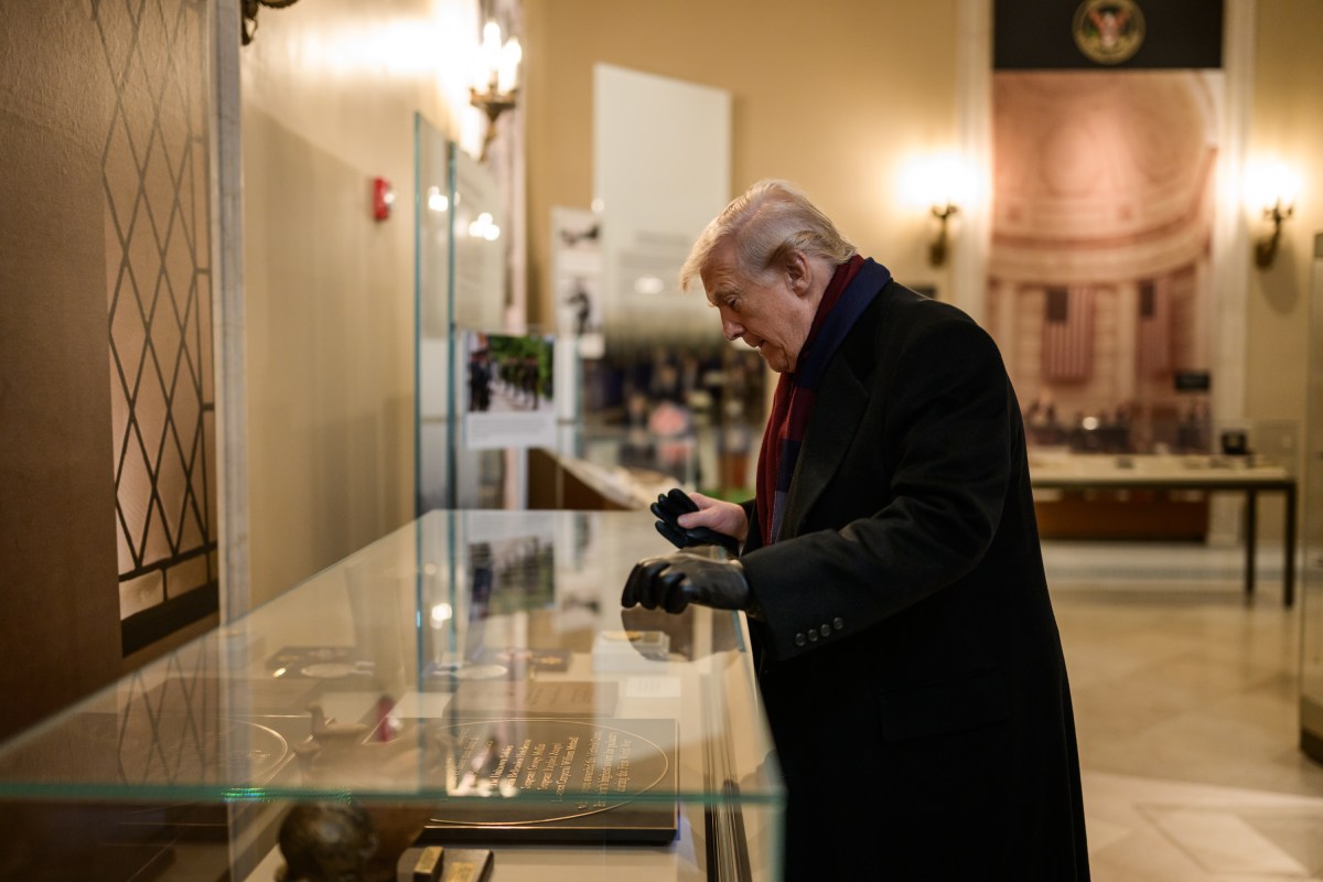President Donald Trump looks at a display in the Memorial Display Room at Arlington National Cemetery in Arlington, Virginia during Veterans Day ceremonies, Tuesday, November 11, 2025. (Official White House Photo by Daniel Torok)