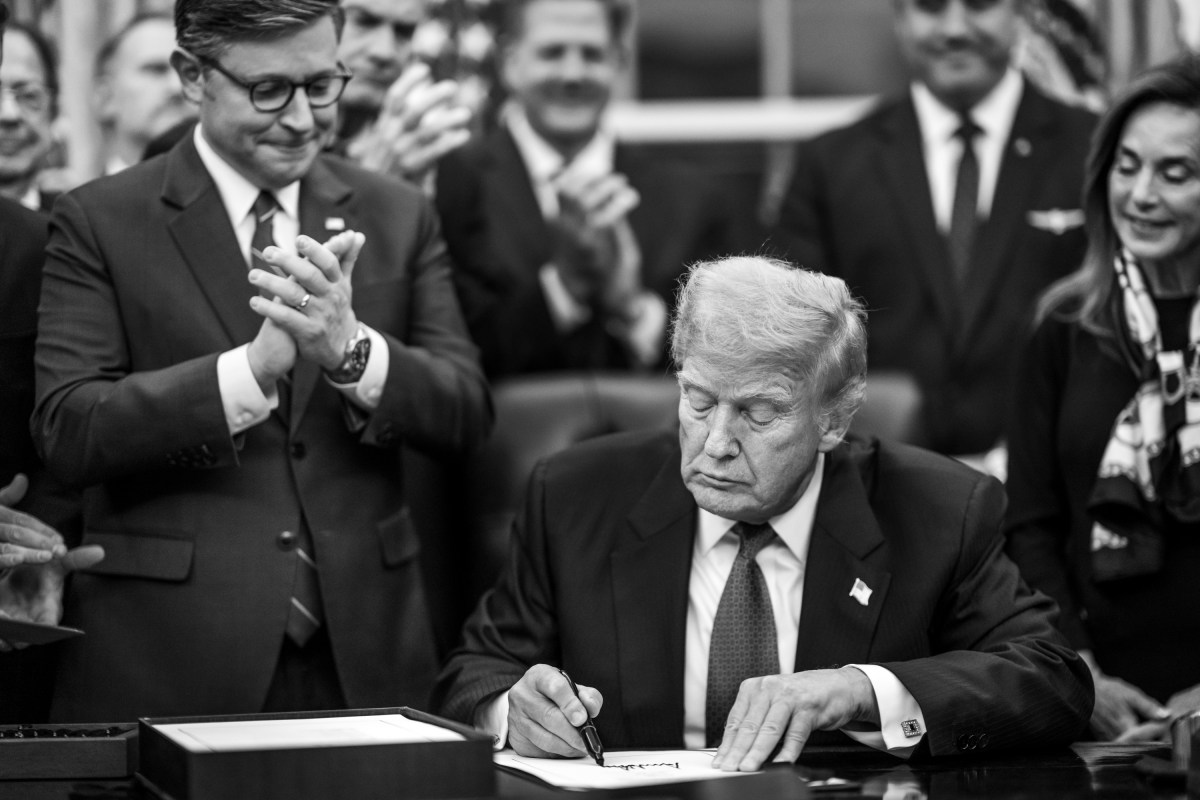 President Donald Trump signs the funding bill that reopens the government alongside Speaker of the House Mike Johnson, Wednesday, November 12, 2025, in the Oval Office. (Official White House Photo by Daniel Torok)