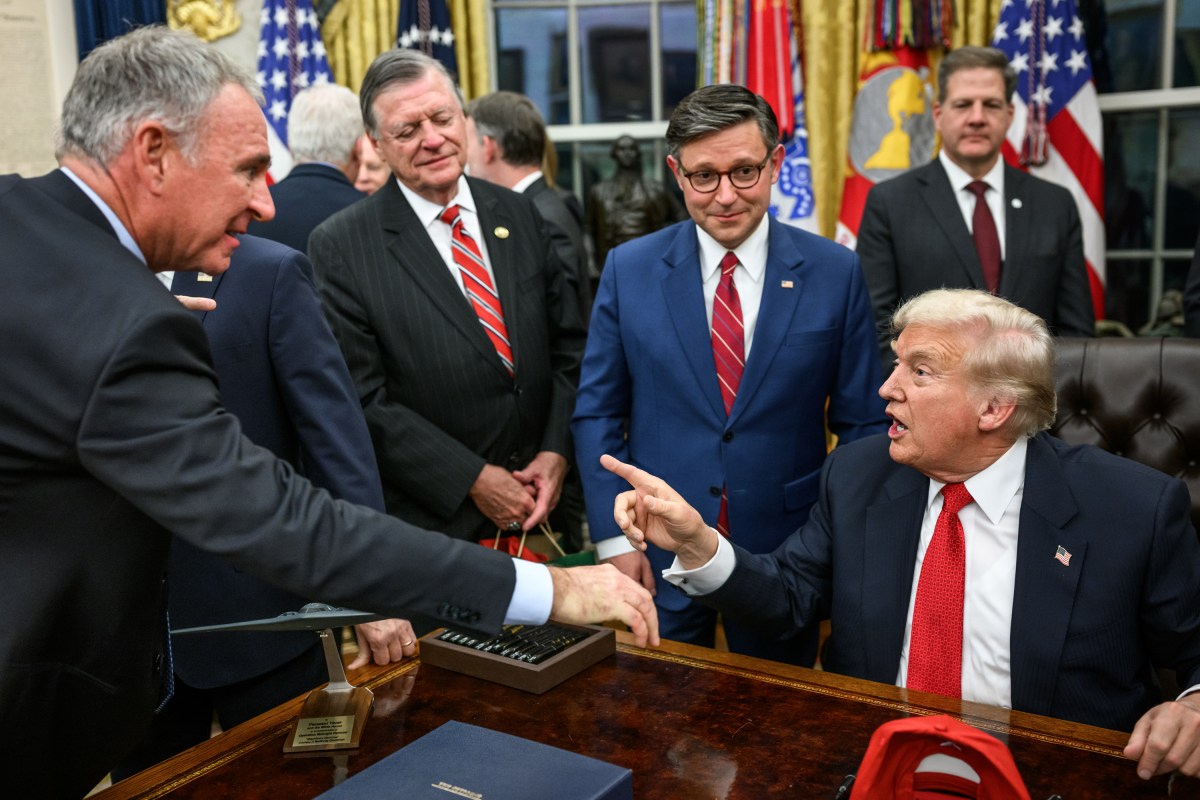 President Donald Trump is congratulated by financial executives and others after signing the funding bill that reopens the government, Wednesday, November 12, 2025, in the Oval Office. (Official White House Photo by Daniel Torok)