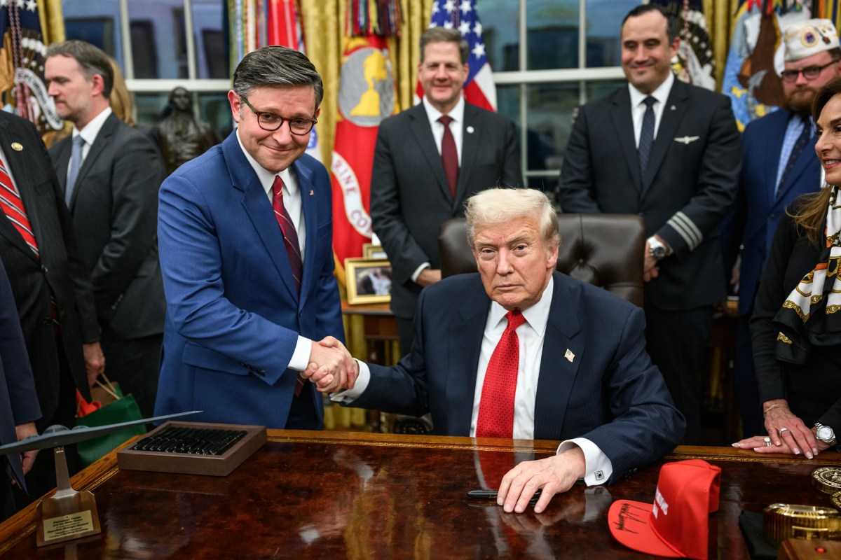 President Donald Trump and Speaker of the House Mike Johnson shake hands after signing the funding bill that reopens the government, Wednesday, November 12, 2025, in the Oval Office. (Official White House Photo by Daniel Torok)