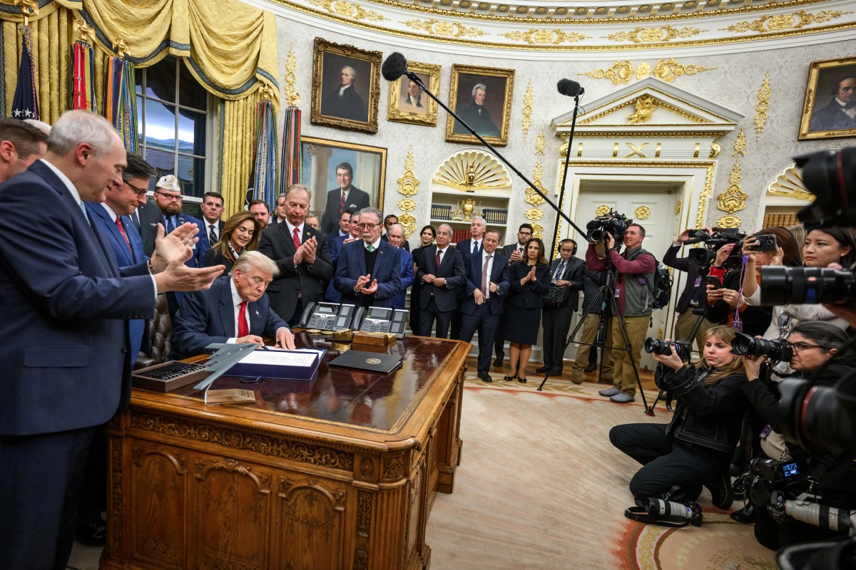 President Donald Trump signs the funding bill from Congress that reopens the government, Wednesday, November 12, 2025, in the Oval Office. (Official White House Photo by Joyce N. Boghosian)