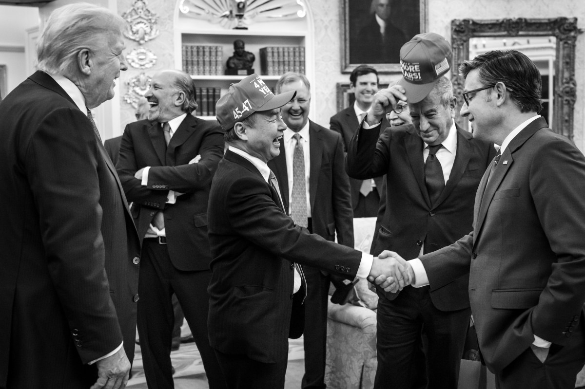 President Donald Trump speaks with Secretary of Commerce Howard Lutnick, Speaker of the House Mike Johnson and financial executives in the Oval Office after signing the funding bill that reopened the government, Wednesday, November 12, 2025. (Official White House Photo by Joyce N. Boghosian)