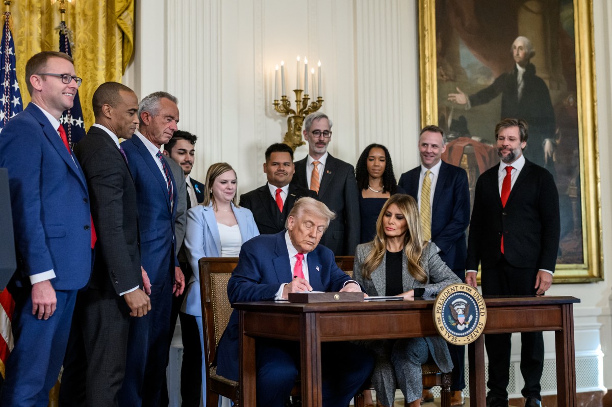 President Donald Trump signs a “Fostering the Future” executive order on foster care, Thursday, November 13, 2025, in the East Room of the White House. (Official White House Photo by Joyce N. Boghosian)