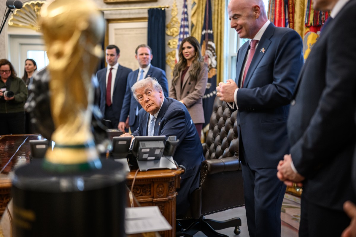 President Donald Trump looks on FIFA President Gianni Infantino addresses members of the media, Monday, November 17, 2025, in the Oval Office. (Official White House Photo by Daniel Torok)