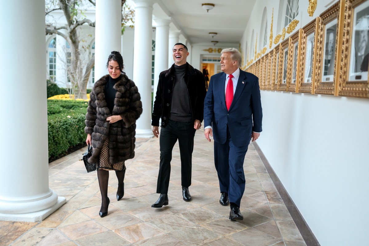 President Donald Trump walks with Cristiano Ronaldo and Georgina Rodríguez on the West Colonnade of the White House, Tuesday, November 18, 2025. (Official White House Photo by Daniel Torok)