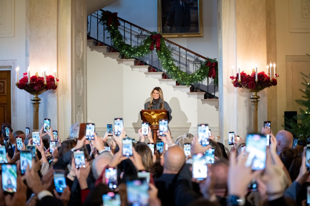 First Lady Melania Trump speaks at a Christmas reception for White House volunteers, Monday, December 01, 2025 in the Grand Foyer of The White House. (Official White House photo by Andrea Hanks)