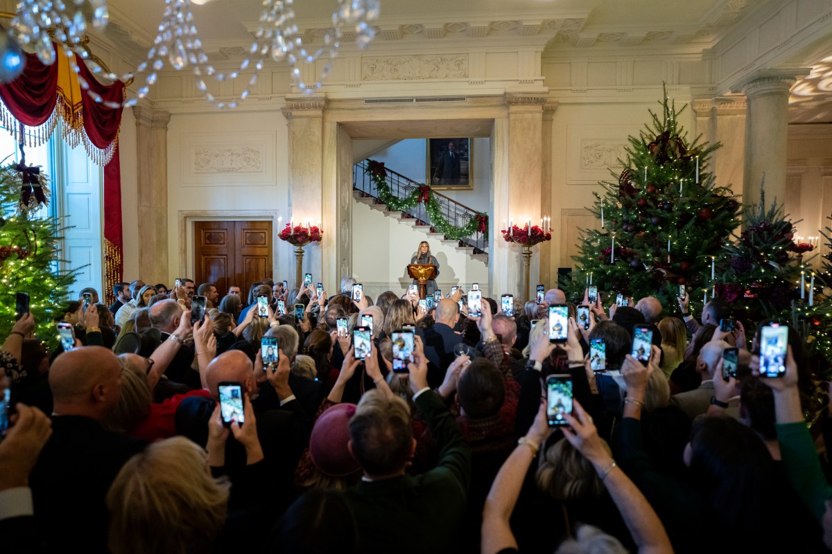 First Lady Melania Trump speaks at a Christmas reception for White House volunteers, Monday, December 01, 2025 in the Grand Foyer of The White House. (Official White House photo by Andrea Hanks)