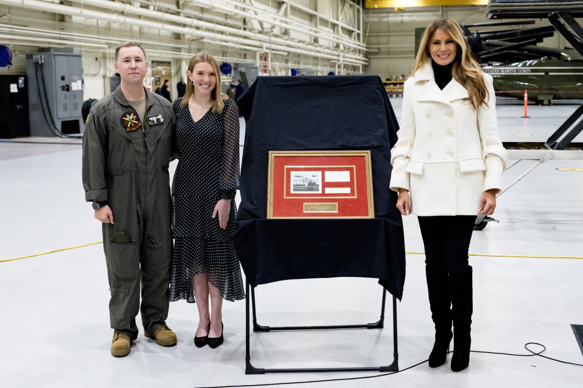 First Lady Melania Trump takes photos with the Marines of Marine Helicopter Squadron 1 at Marine Corps Air Facility Quantico, Monday, December 8, 2025. (Official White House photo by Andrea Hanks)