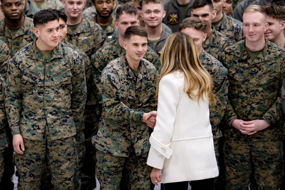 First Lady Melania Trump takes photos with the Marines of Marine Helicopter Squadron 1 at Marine Corps Air Facility Quantico, Monday, December 8, 2025. (Official White House photo by Andrea Hanks)