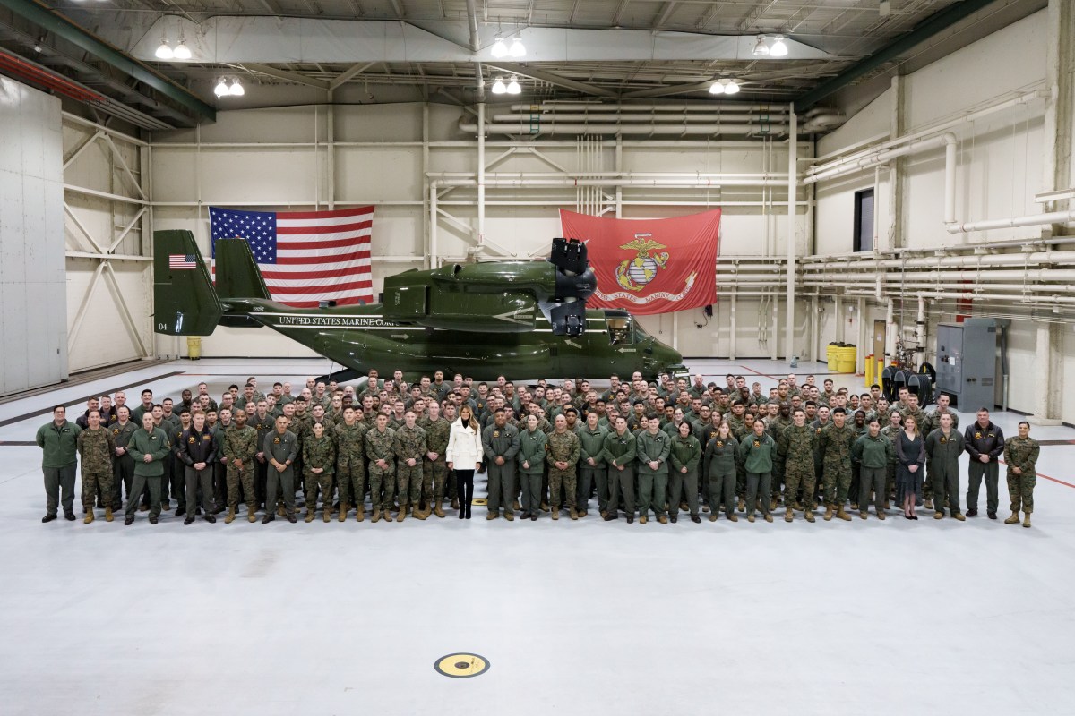 First Lady Melania Trump takes photos with the Marines of Marine Helicopter Squadron 1 at Marine Corps Air Facility Quantico, Monday, December 8, 2025. (Official White House photo by Andrea Hanks)