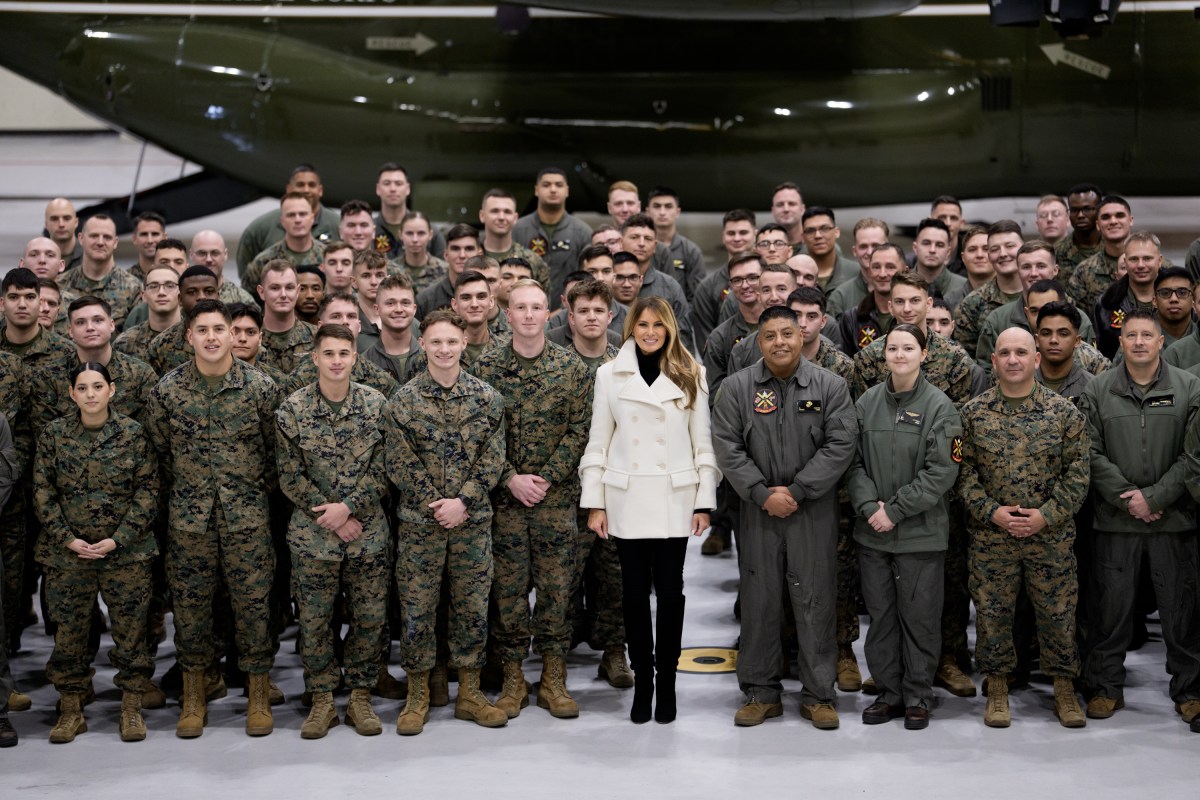 First Lady Melania Trump takes photos with the Marines of Marine Helicopter Squadron 1 at Marine Corps Air Facility Quantico, Monday, December 8, 2025. (Official White House photo by Andrea Hanks)