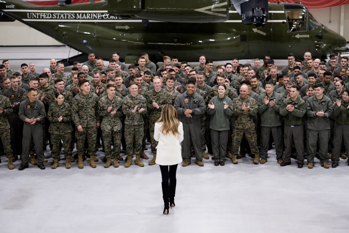 First Lady Melania Trump takes photos with the Marines of Marine Helicopter Squadron 1 at Marine Corps Air Facility Quantico, Monday, December 8, 2025. (Official White House photo by Andrea Hanks)