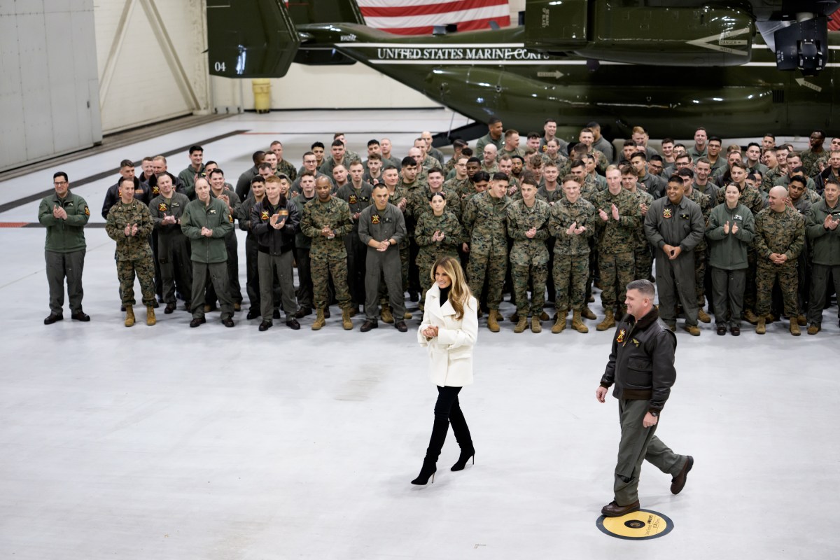 First Lady Melania Trump takes photos with the Marines of Marine Helicopter Squadron 1 at Marine Corps Air Facility Quantico, Monday, December 8, 2025. (Official White House photo by Andrea Hanks)