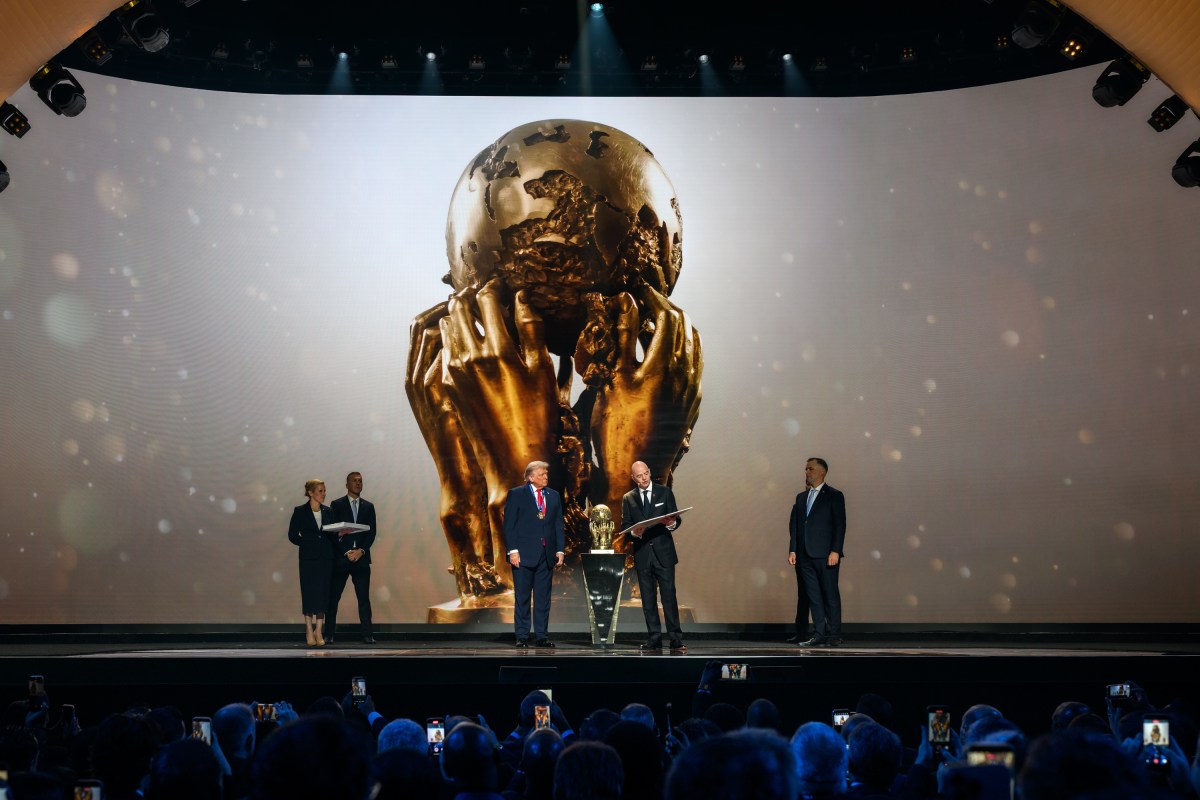 President Donald Trump accepts the inaugural FIFA Peace Prize from FIFA President Gianni Infantino, Friday, December 5, 2025, during the FIFA World Cup drawing at the John F. Kennedy Center for the Performing Arts in Washington, D.C. (Official White House Photo by Daniel Torok)