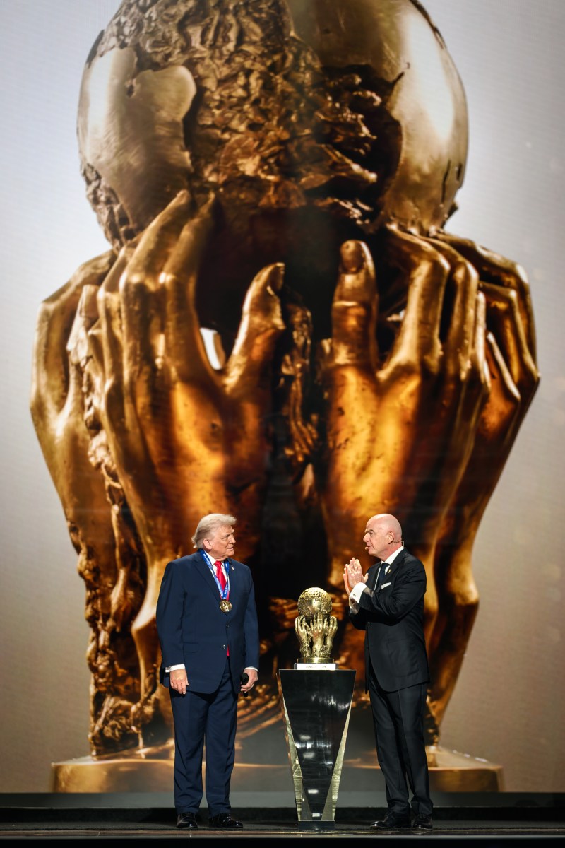 President Donald Trump accepts the inaugural FIFA Peace Prize from FIFA President Gianni Infantino, Friday, December 5, 2025, during the FIFA World Cup drawing at the John F. Kennedy Center for the Performing Arts in Washington, D.C. (Official White House Photo by Daniel Torok)